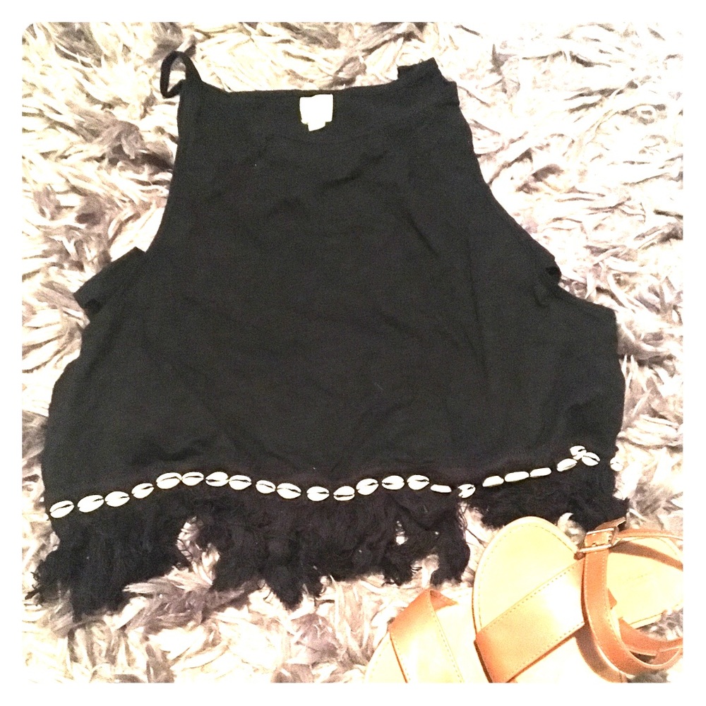 Frayed sea shell crop top with side cut outs!